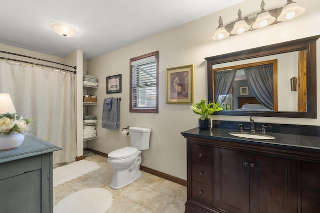 1737 Bratton Ln, Williamsport, TN 38487 - bathroom with tile patterned floors, a shower with shower curtain, toilet, vanity, and baseboards