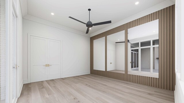544 Bonaire Ln, Franklin, TN 37064 - spare room featuring wood finished floors, ceiling fan, and recessed lighting