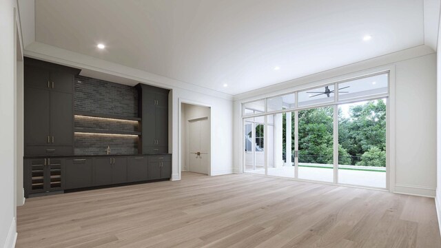 544 Bonaire Ln, Franklin, TN 37064 - unfurnished living room featuring light wood-type flooring, recessed lighting, and bar