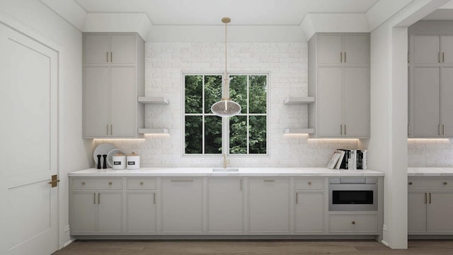 544 Bonaire Ln, Franklin, TN 37064 - kitchen featuring open shelves, backsplash, light countertops, and gray cabinetry