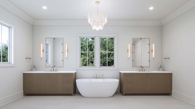 544 Bonaire Ln, Franklin, TN 37064 - full bathroom with a chandelier, two vanities, a freestanding tub, and recessed lighting