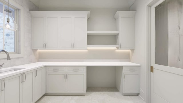 544 Bonaire Ln, Franklin, TN 37064 - kitchen with open shelves, healthy amount of natural light, light countertops, and white cabinetry