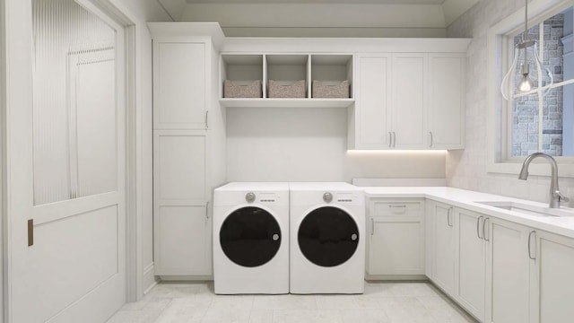 544 Bonaire Ln, Franklin, TN 37064 - laundry room with independent washer and dryer, cabinet space, and light tile patterned flooring