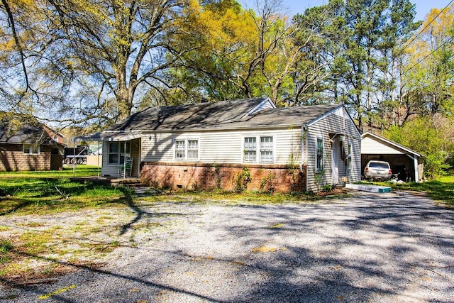 view of side of home featuring brick siding