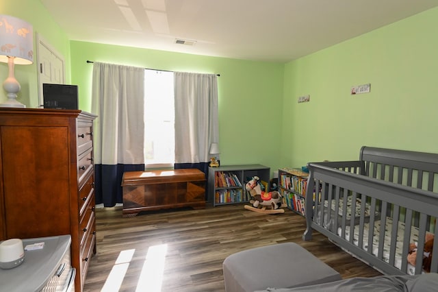 602 Bradburn Village Cir, Antioch, TN 37013 - bedroom featuring visible vents and wood finished floors