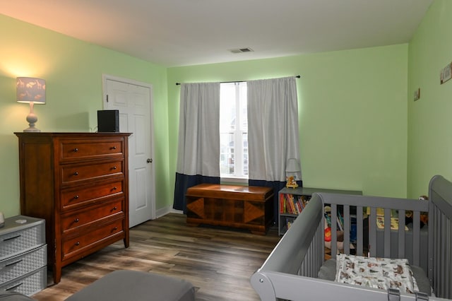 602 Bradburn Village Cir, Antioch, TN 37013 - bedroom with wood finished floors and visible vents