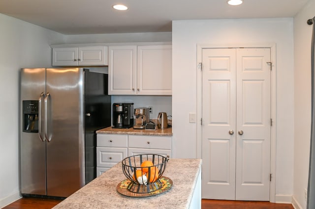 602 Bradburn Village Cir, Antioch, TN 37013 - kitchen featuring stainless steel fridge with ice dispenser, white cabinetry, recessed lighting, and dark wood-type flooring