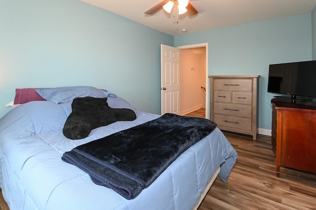 602 Bradburn Village Cir, Antioch, TN 37013 - bedroom with baseboards, ceiling fan, and wood finished floors