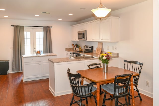 602 Bradburn Village Cir, Antioch, TN 37013 - dining space with dark wood-style flooring, visible vents, and recessed lighting