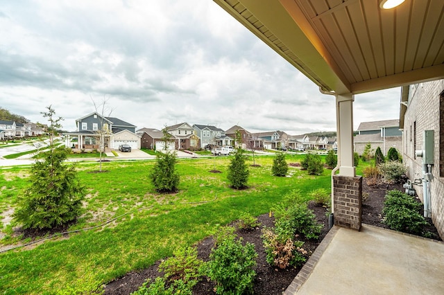 view of yard with a residential view