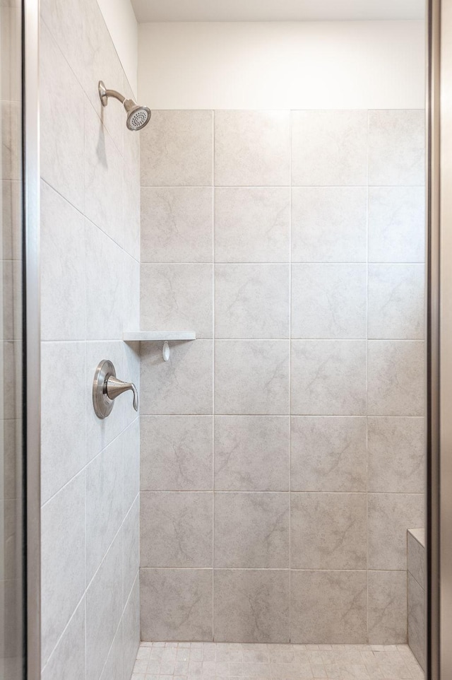 bathroom featuring a stall shower