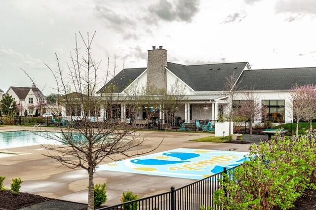 view of pool with fence