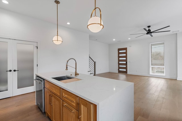 807 32nd Ave N Unit A, Nashville, TN 37209 - kitchen featuring french doors, a sink, hardwood / wood-style flooring, pendant lighting, and dishwasher