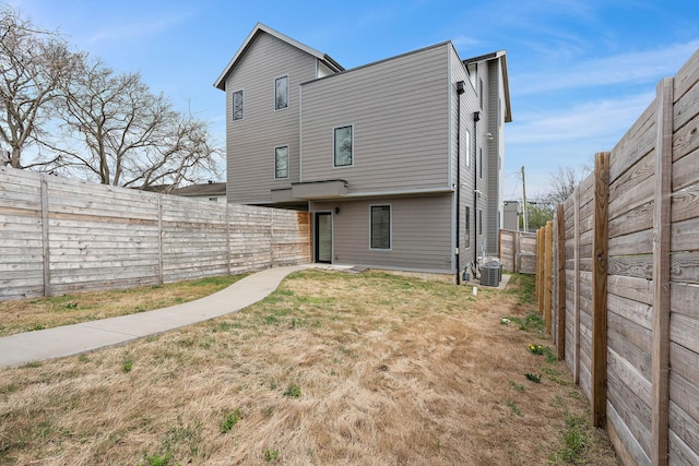 807 32nd Ave N Unit A, Nashville, TN 37209 - rear view of property with a fenced backyard and cooling unit