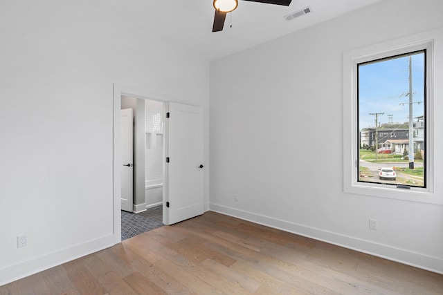 807 32nd Ave N Unit A, Nashville, TN 37209 - spare room with baseboards, ceiling fan, visible vents, and wood finished floors