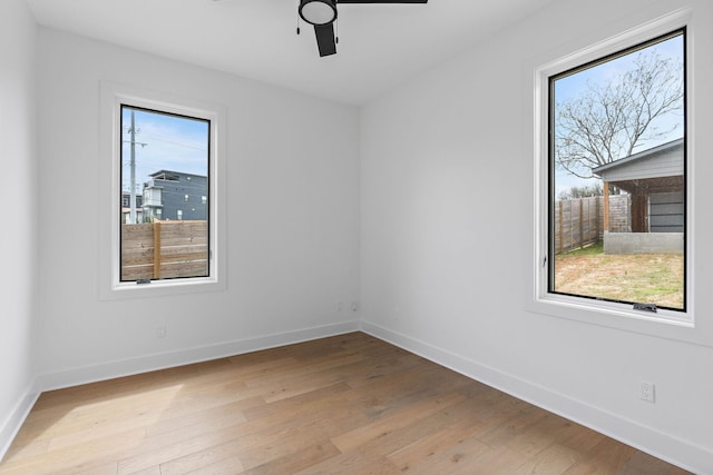 807 32nd Ave N Unit A, Nashville, TN 37209 - spare room featuring light wood finished floors, baseboards, and a healthy amount of sunlight
