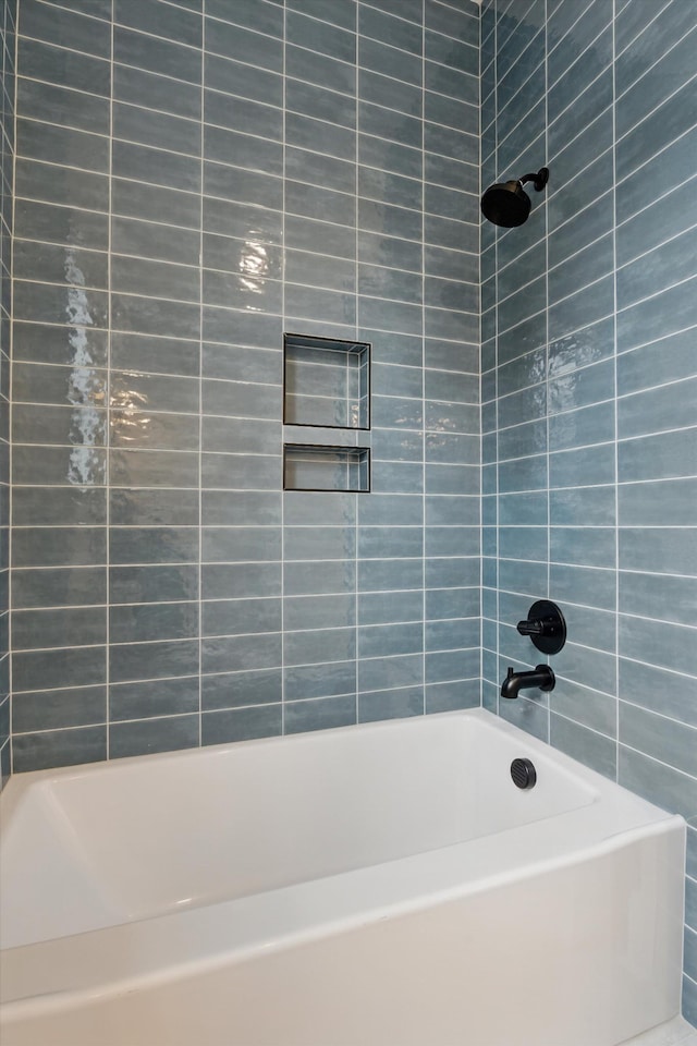bathroom featuring  shower combination