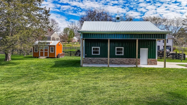 view of shed with fence