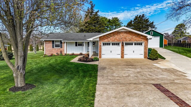 single story home with driveway, a front yard, brick siding, a shingled roof, and a garage