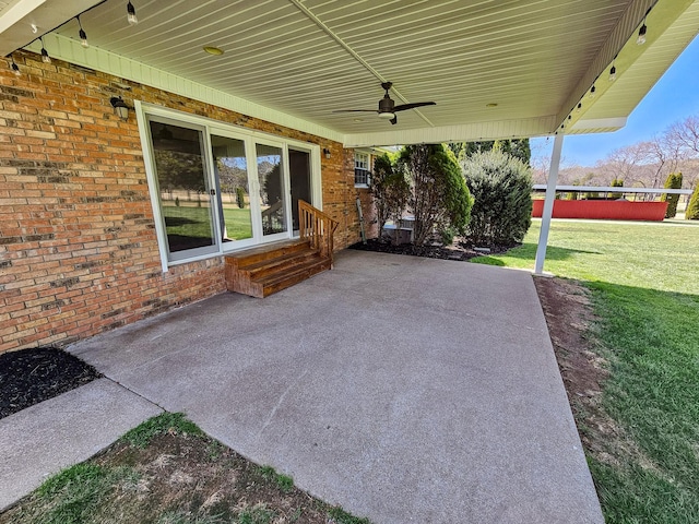 view of patio with entry steps and a ceiling fan