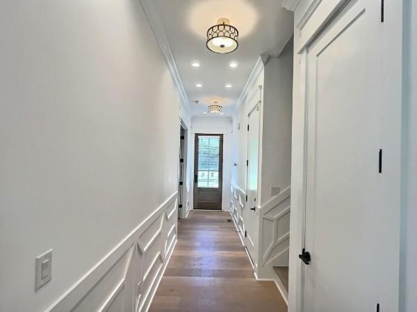 1412 Woodmont Blvd, Nashville, TN 37215 - hallway with wood finished floors, a wainscoted wall, crown molding, and a decorative wall