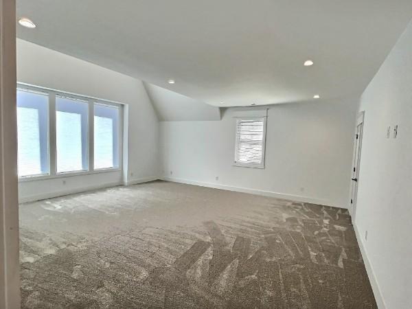 1412 Woodmont Blvd, Nashville, TN 37215 - additional living space with baseboards, recessed lighting, lofted ceiling, and carpet flooring