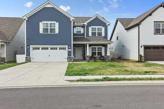 3652 Stormy Ln, Rockvale, TN 37153 - craftsman inspired home with stone siding, a garage, a front lawn, and concrete driveway