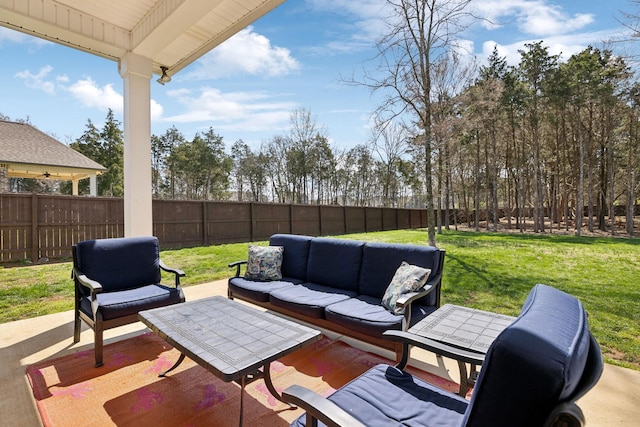 view of patio with a fenced backyard and outdoor lounge area