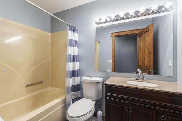 bathroom featuring shower / tub combo, toilet, and vanity