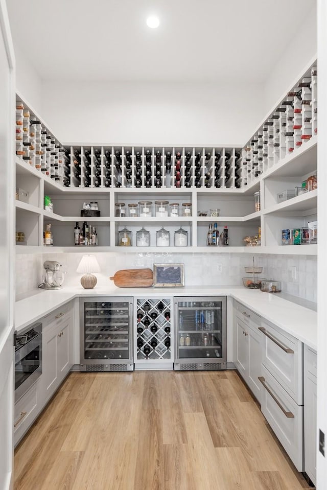 pantry featuring beverage cooler