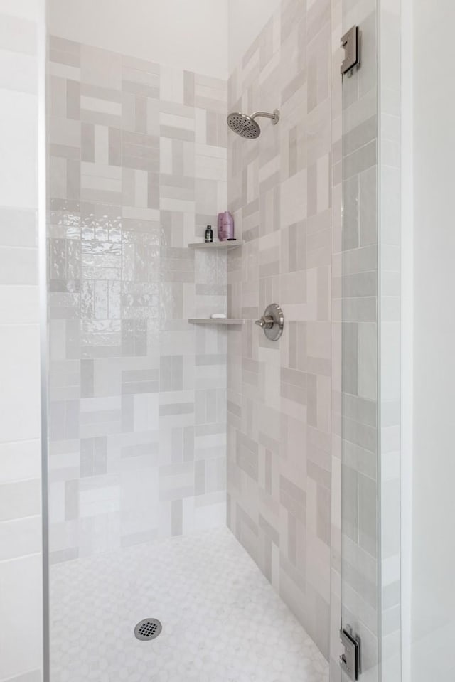 bathroom featuring a shower stall