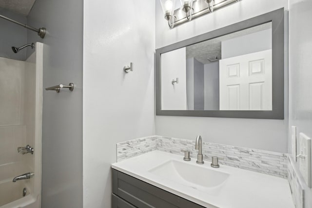 full bath with tub / shower combination and vanity