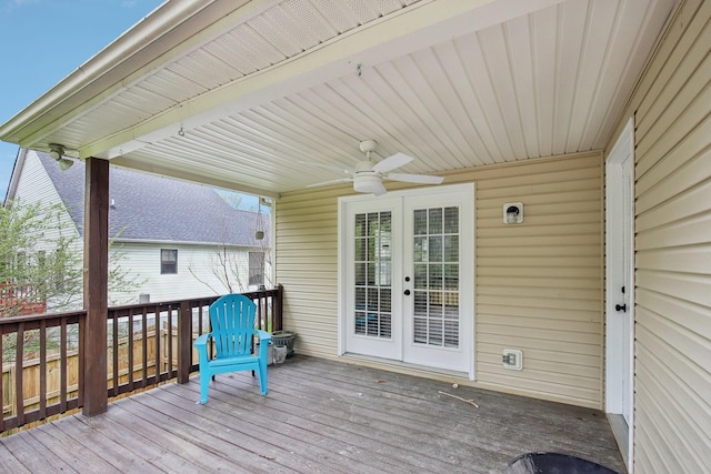 wooden terrace featuring ceiling fan and french doors
