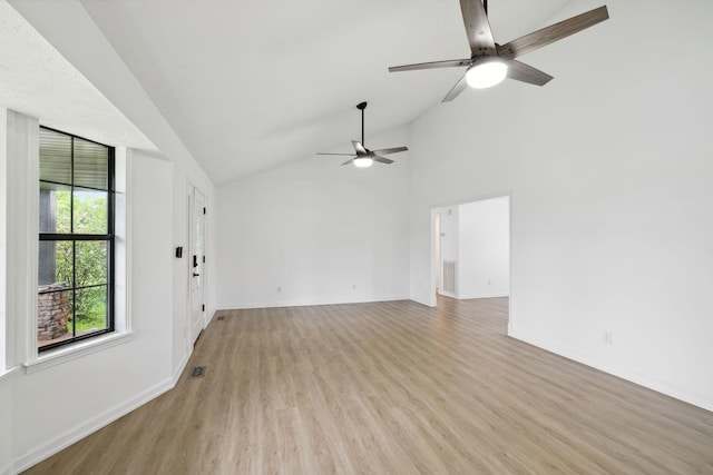 unfurnished room featuring baseboards, light wood-type flooring, visible vents, and a ceiling fan