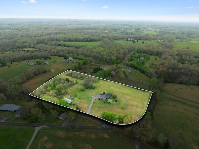 birds eye view of property featuring a rural view
