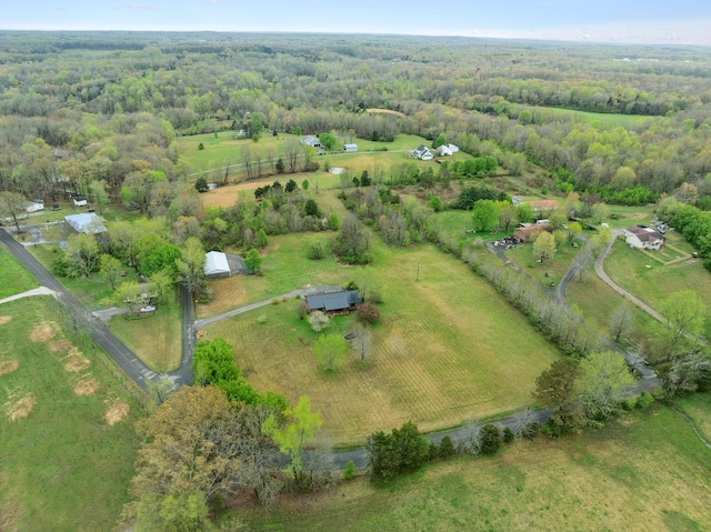 bird's eye view with a forest view and a rural view
