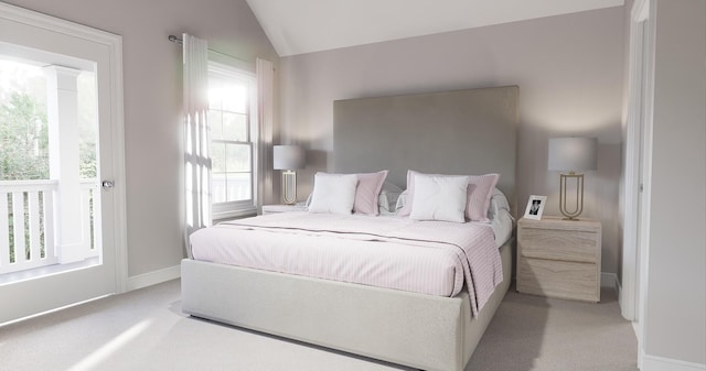 bedroom featuring baseboards, lofted ceiling, and light carpet