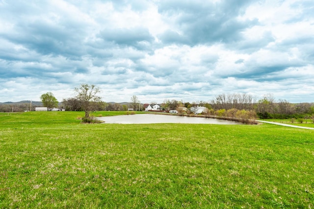 view of yard with a water view