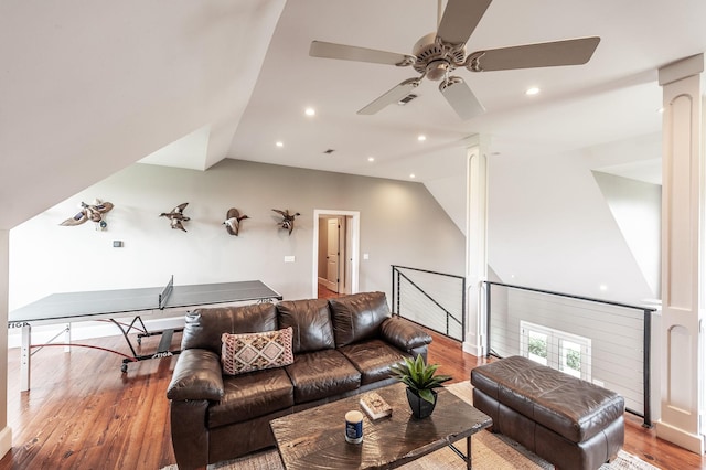 living room with lofted ceiling, wood finished floors, ceiling fan, and recessed lighting