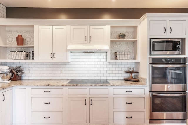 kitchen featuring white cabinets, under cabinet range hood, appliances with stainless steel finishes, and open shelves