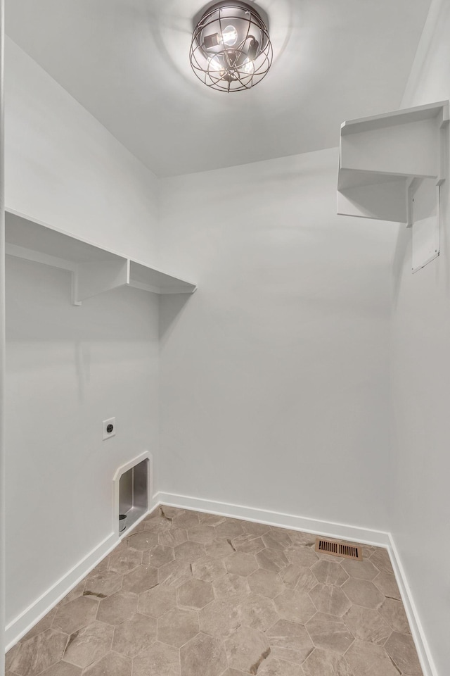 198 Creekside Dr, Lewisburg, TN 37091 - clothes washing area with baseboards, visible vents, laundry area, and electric dryer hookup