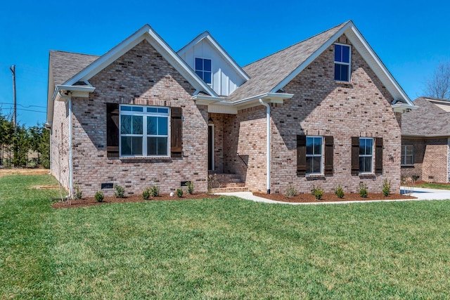 198 Creekside Dr, Lewisburg, TN 37091 - view of front facade with brick siding, a front lawn, board and batten siding, and crawl space