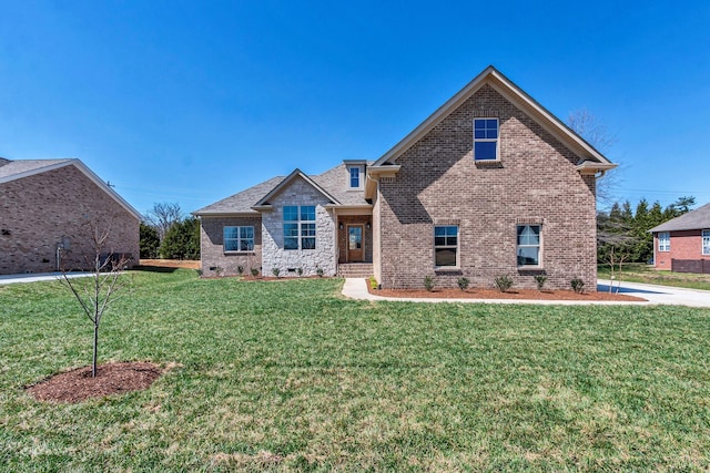 200 Creekside Dr, Lewisburg, TN 37091 - view of front of home with brick siding and a front yard