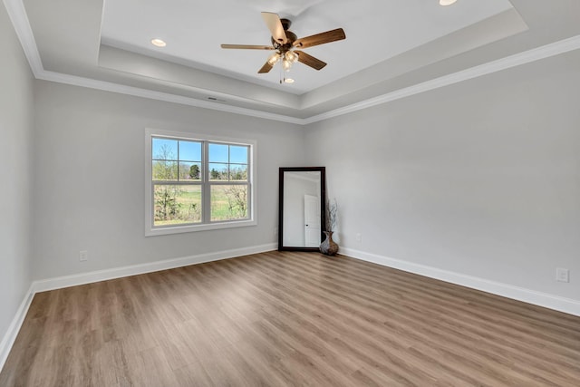 200 Creekside Dr, Lewisburg, TN 37091 - spare room featuring baseboards, wood finished floors, and a raised ceiling