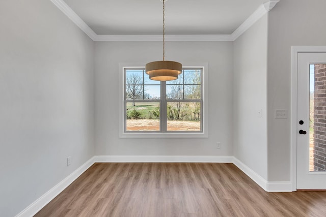 200 Creekside Dr, Lewisburg, TN 37091 - unfurnished dining area with baseboards, ornamental molding, and wood finished floors