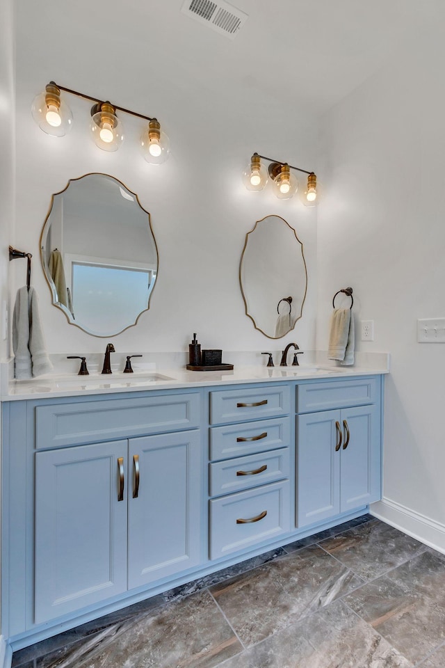 200 Creekside Dr, Lewisburg, TN 37091 - full bath with a sink, double vanity, visible vents, and baseboards