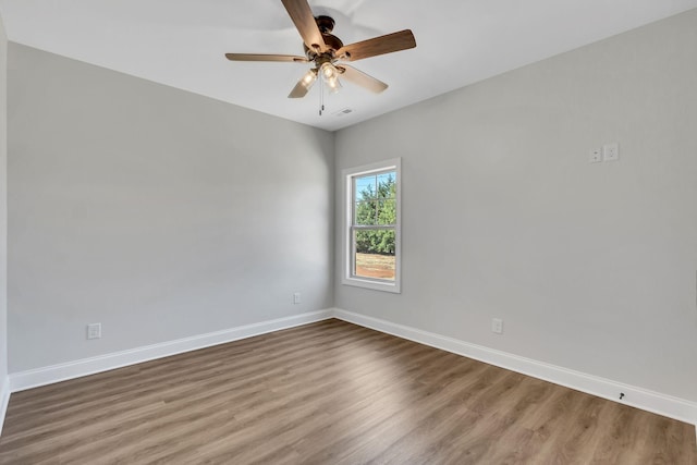 200 Creekside Dr, Lewisburg, TN 37091 - empty room with baseboards, visible vents, ceiling fan, and wood finished floors