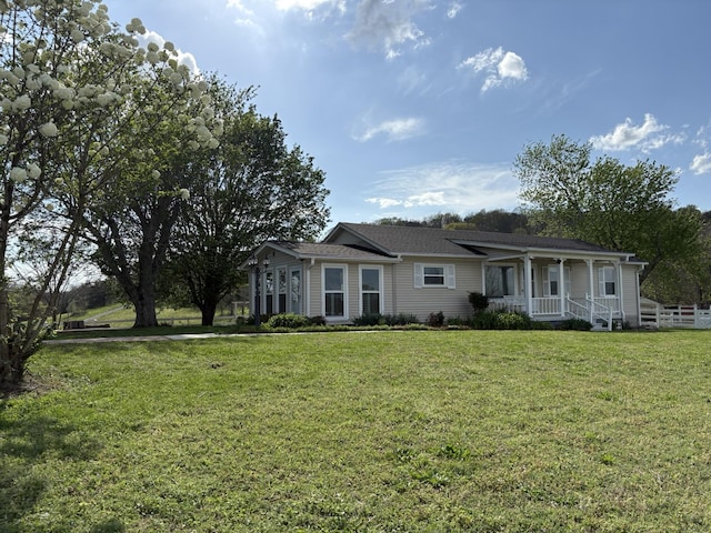 1833 Porterfield Rd, Readyville, TN 37149 - ranch-style house featuring a front yard and covered porch