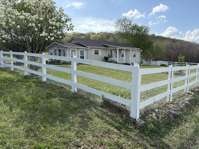 1833 Porterfield Rd, Readyville, TN 37149 - exterior space with a front lawn and a fenced front yard
