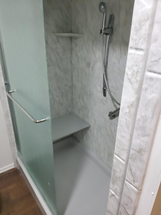 1833 Porterfield Rd, Readyville, TN 37149 - bathroom with walk in shower and wood finished floors